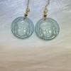 Spiritually inspired 'Enlightened Ascent' Buddha jade earrings with 14K gold, reflecting universal wisdom.