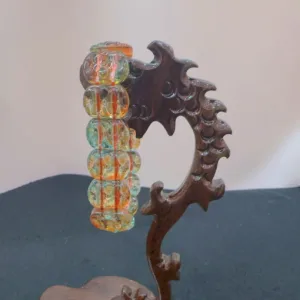 Antique glass bubble sword handle display
