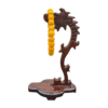 Carved wooden stand with yellow spiral object