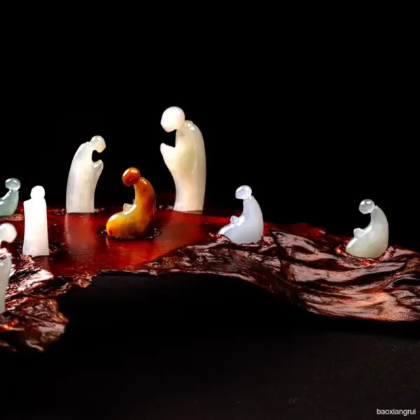 Artistic edible sugar work resembling ghost figures on dark background.