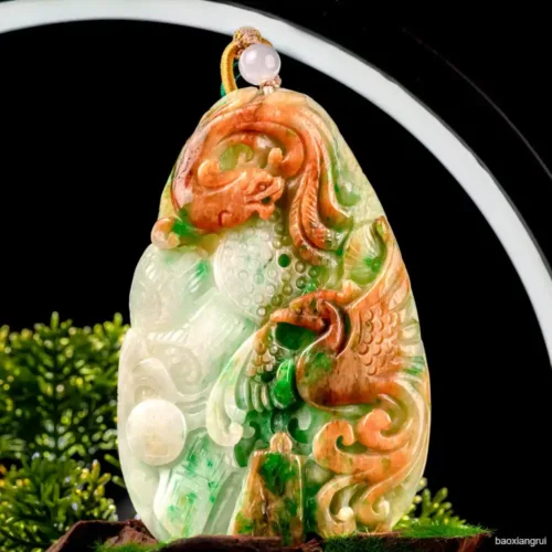 Carved jade pendant with dragon motif.