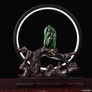 Fantasy sculpture with illuminated green backdrop.