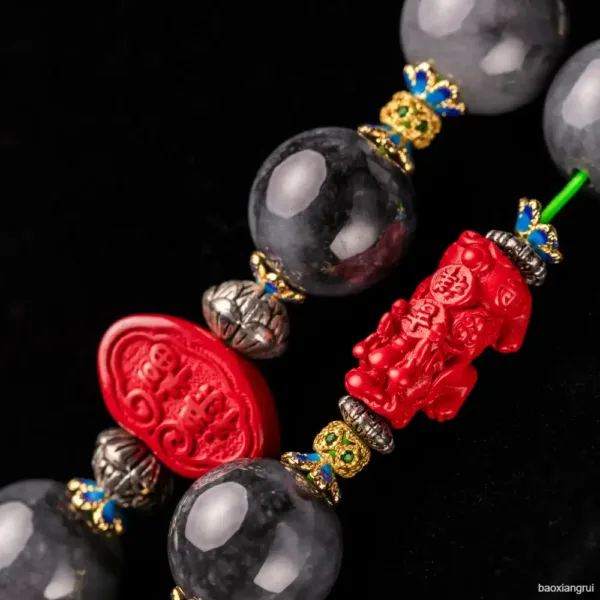 Traditional beaded bracelet with red carved charms.