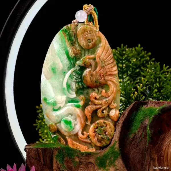 Carved jade dragon pendant with pearl.