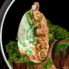 Carved jade dragon pendant with pearl.