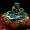 Jade dragon sculpture on wooden base with moss.