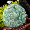 Intricate jade pendant carving.