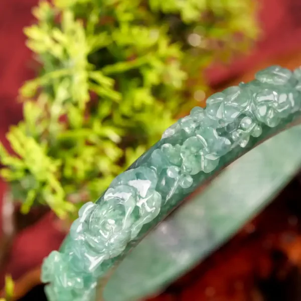 Close-up of a green crystal bracelet on natural background.